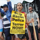 Demonstrators protest outside the Ferguson, Mo., police department during the National March on Ferguson, August 30, 2014.
Photo by Michael B. Thomas/AFP/Getty Images